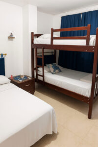 Inicio hostal hump back int puerto lopez ecuador arcoiris habitaciones7